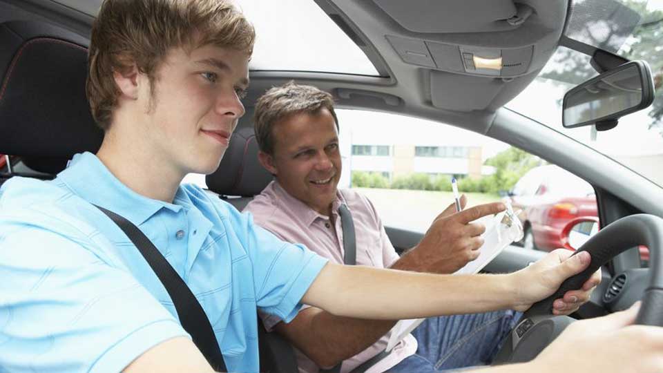 Learner Driver Holding Steering Wheel Image